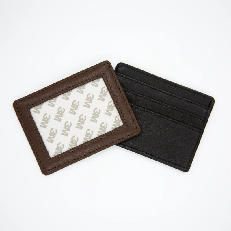 Brown and black card holders on a white background
