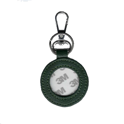 Green keychain with a circular component featuring '3M' on a white background